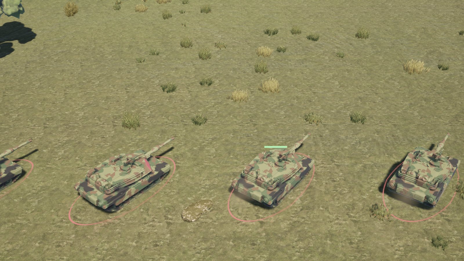 Three camouflaged tanks on a grassy battlefield